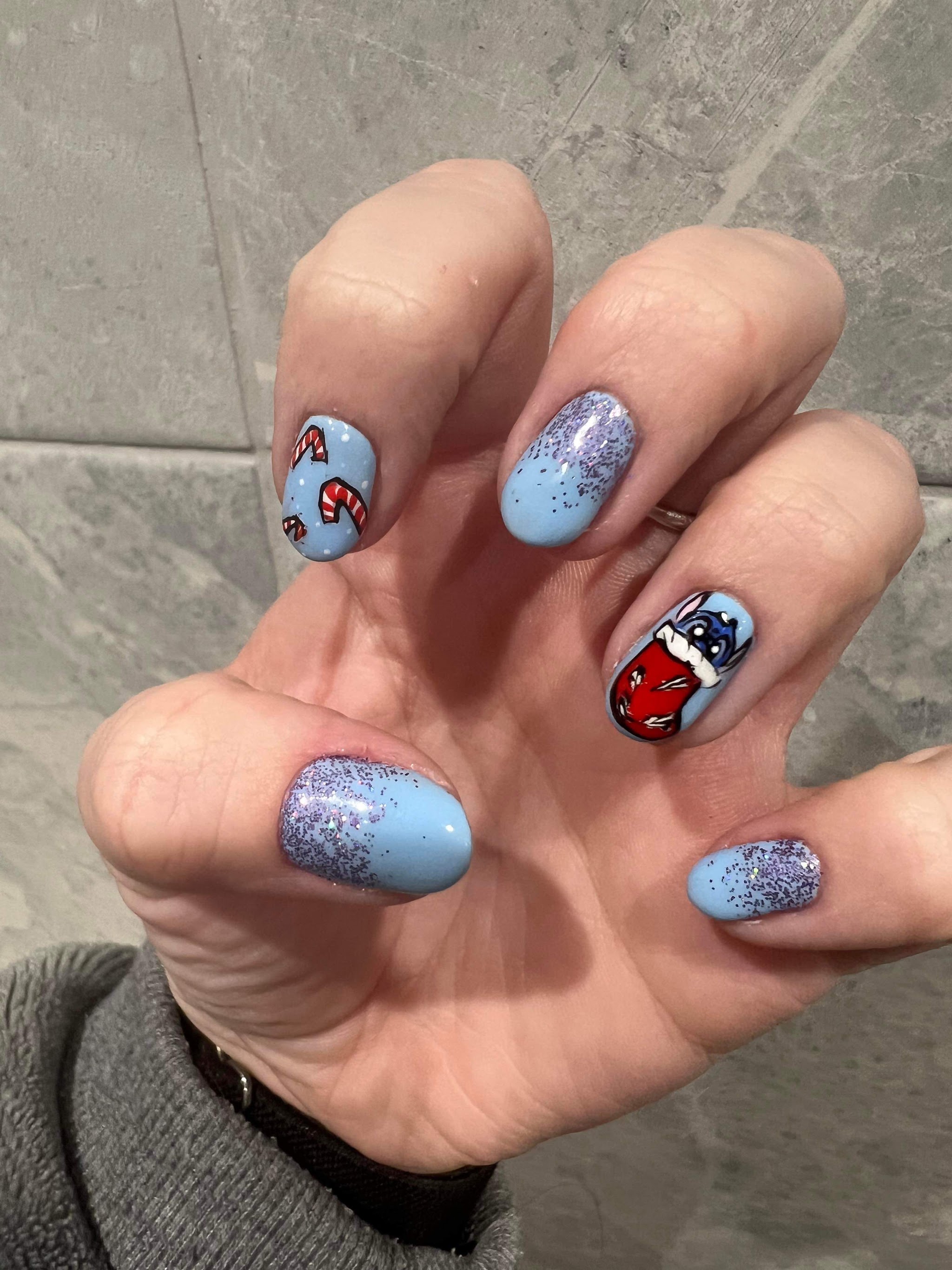 Christmas set in pale blue with lilac glitter, a candy cane and a stocking