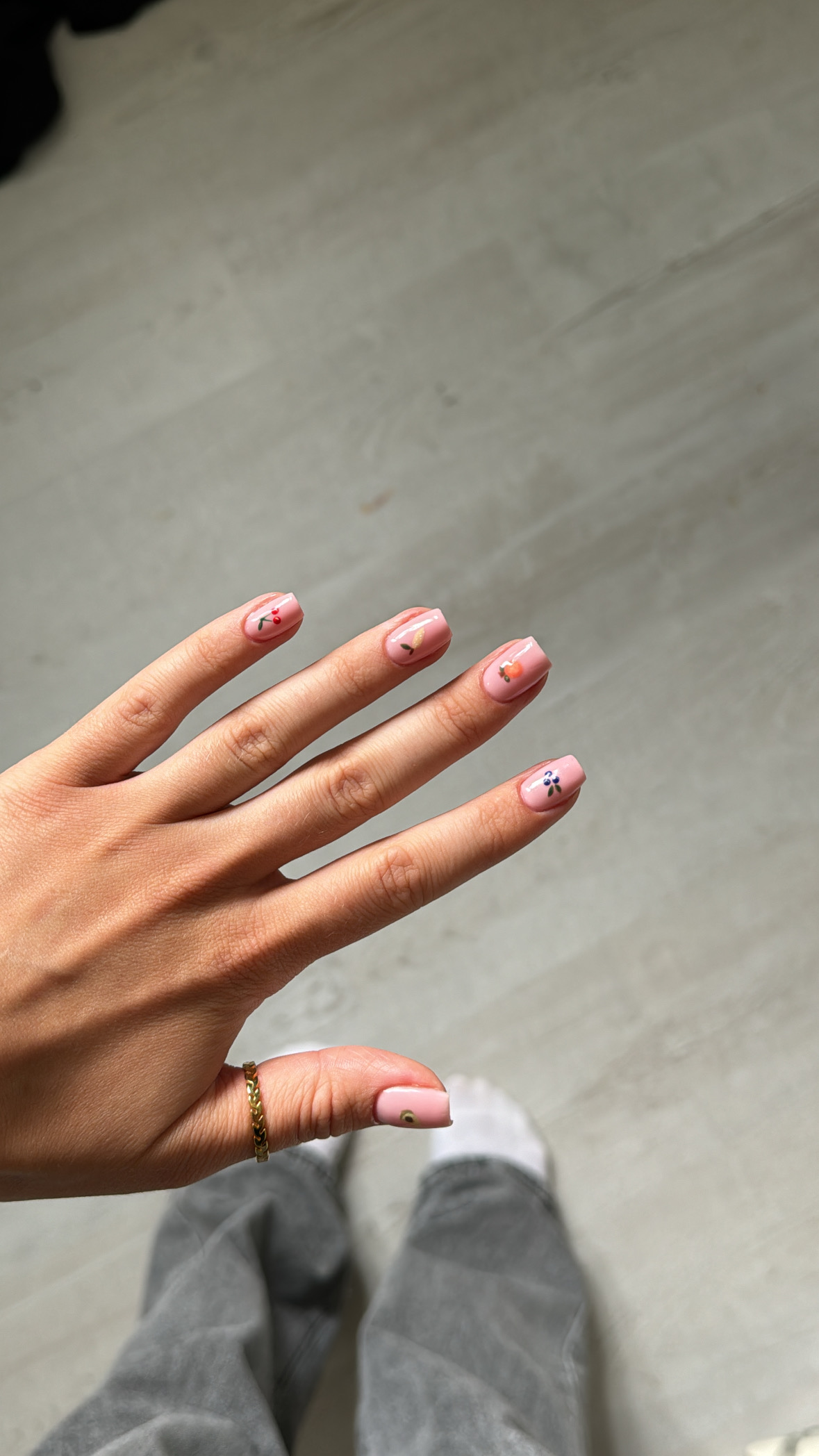 Nude almond nails with small art accents